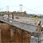 Labourers busy in construction work of bridge at KakPull during development work