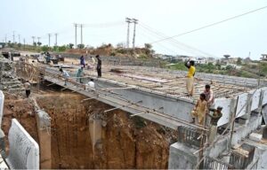 Labourers busy in construction work of bridge at KakPull during development work
