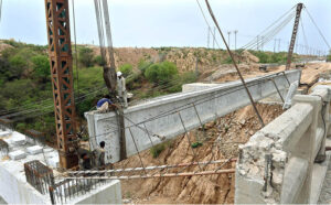 Labourers busy in construction work of bridge at KakPull during development work
