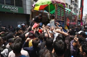 A large number of mourners offering Zuhar prayers during the procession on 10th of the Holy Month of Muharramul Harram. Muharram is the mourning month in remembrance of the Shahadat of Hazrat Imam Hussain (RA), the Grandson of the Holy Prophet Mohammad (PBUH).