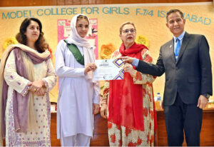 CEO International Governance and Sustainability Institute Dr. Sultan Azam Temuri awarding certificates among students in closing ceremony of Summer Fiesta Program organized by Federal Ministry of Education held at IMCG F-7/4