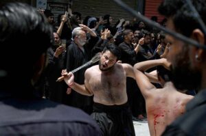 Mourners oozing themselves with knives and chains during Aashura procession on 10th of Holy Month of Muharramul Harram. Muharram is the mourning month in remembrance of the Shahadat of Hazrat Imam Hussain (RA), the grandson of the Holy Prophet Mohammad (PBUH).