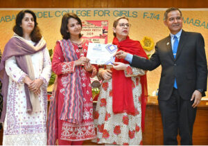 CEO International Governance and Sustainability Institute Dr. Sultan Azam Temuri awarding certificates among students in closing ceremony of Summer Fiesta Program organized by Federal Ministry of Education held at IMCG F-7/4