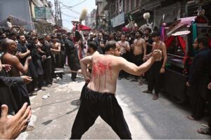 Mourners oozing themselves with knives and chains during Aashura procession on 10th of Holy Month of Muharramul Harram. Muharram is the mourning month in remembrance of the Shahadat of Hazrat Imam Hussain (RA), the grandson of the Holy Prophet Mohammad (PBUH).