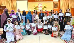 CEO International Governance and Sustainability Institute Dr. Sultan Azam Temuri awarding certificates among students in closing ceremony of Summer Fiesta Program organized by Federal Ministry of Education held at IMCG F-7/4