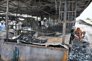 Stall holders examine and collecting the burnt remains of their stalls which burnt due to yesterday’s fire at the H-9 Weekly Bazaar