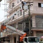 WAPDA worker busy in repairing electricity wires at Sadar road