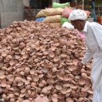 A vendor displaying clay pots (Kujji Thuthi) used for distributing (Niaz) on the occasion of Muharram ul Haram in the city