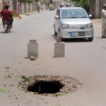 A view of the damaged road near the excise office may cause any mishap that needs the attention of concerned authorities