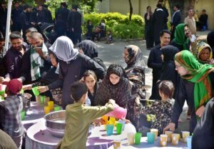 Volunteers offering drink to mourners during main procession on 9th Muharramul Haram at G-6. Muharramul Harram known as the first month of the Islamic calendar and the mourning month in remembrance of the martyrdom (Shahadat) of Hazrat Imam Hussain (RA), the grandson of the Holy Prophet Mohammad (PBUH).