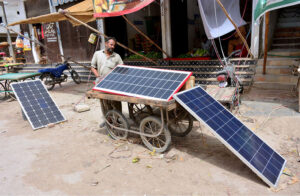 A view of solar panels installed outside shop for providing a renewable energy source at fruit market