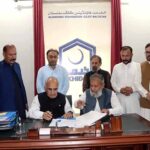 VC Karakoram International University Attaullah Shah and President Al Khadmat Foundation Faridullah Khan signing MoU between KIU and Al Khadmat Foundation
