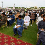 Large numbers of Students solving papers during grand entry-test for admission of Governor Sindh Kamran Tessori IT initiative Program 2024 at Niaz stadium