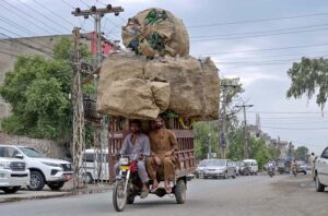Overloaded motorcycle rickshaw on the way at Railway road urgent attention needed to prevent mishaps in the city.