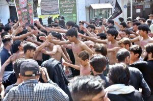 Volunteers offering drink to mourners during main procession on 9th Muharramul Haram at G-6. Muharramul Harram known as the first month of the Islamic calendar and the mourning month in remembrance of the martyrdom (Shahadat) of Hazrat Imam Hussain (RA), the grandson of the Holy Prophet Mohammad (PBUH).
