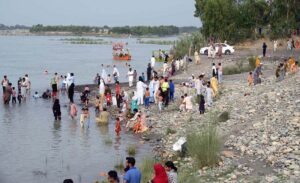 Visitors are enjoying the swing at Picnic Point near the Attock River as a large number of people have arrived to spend their holiday