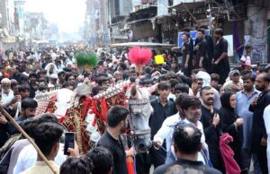 Volunteers serving food to the mourners attending the Ashura procession on 10th of Muharramul Harram. Muharram is the mourning month in remembrance of the Shahadat of Hazrat Imam Hussain (RA), the grandson of the Holy Prophet Mohammad (PBUH).