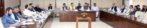 Senator Muhammad Abdul Qadir, chairman senate standing committee on defence production presiding over a meeting of the committee at Parliament House.