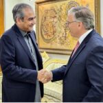 Federal Minister for Interior Mohsin Naqvi presenting souvenir to US Ambassador Donald Blome
