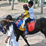 Children enjoy horse ride at famous picnic spot Daman-e-Koh