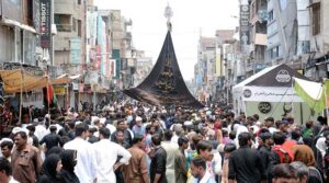 Volunteers serving food to the mourners attending the Ashura procession on 10th of Muharramul Harram. Muharram is the mourning month in remembrance of the Shahadat of Hazrat Imam Hussain (RA), the grandson of the Holy Prophet Mohammad (PBUH).