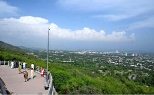 An attractive view of Faisal Masjid through famous picnic spot Daman-e-Koh