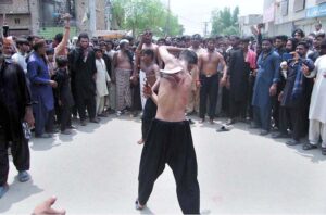 Mourners beating themselves during procession on 9th Muharramul Haram. Muharramul Harram known as the first month of the Islamic calendar and the mourning month in remembrance of the martyrdom (Shahadat) of Hazrat Imam Hussain (RA), the grandson of the Holy Prophet Mohammad (PBUH).