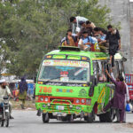A large number of passengers travelling on rooftop of passenger bus at Rawat may cause any mishap and needs the attention of the concerned authorities