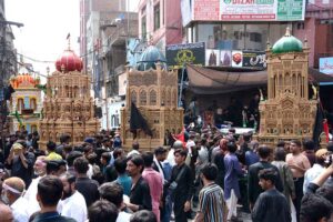 Volunteers serving food to the mourners attending the Ashura procession on 10th of Muharramul Harram. Muharram is the mourning month in remembrance of the Shahadat of Hazrat Imam Hussain (RA), the grandson of the Holy Prophet Mohammad (PBUH).