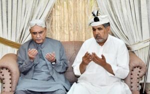 President Asif Ali Zardari offering Fateha for Captain Muhammad Osama bin Arshad Shaheed, during his visit to Shaheed's family home