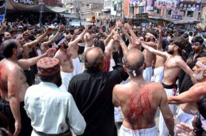 Mourners beating themselves during procession on 10th of Holy Month of Muharramul Harram. Muharram is the mourning month in remembrance of the Shahadat of Hazrat Imam Hussain (RA), the Grandson of the Holy Prophet Mohammad (PBUH).