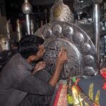 A worker busy in preparing Moharam ul Haram related stuff at his workplace