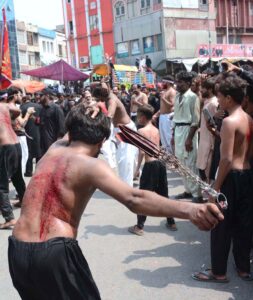Mourners beating themselves during procession on 10th of Holy Month of Muharramul Harram. Muharram is the mourning month in remembrance of the Shahadat of Hazrat Imam Hussain (RA), the Grandson of the Holy Prophet Mohammad (PBUH).