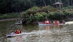 People are enjoying boating at Gulshan-e-Iqbal Park as large number of people arrives to spend their holiday