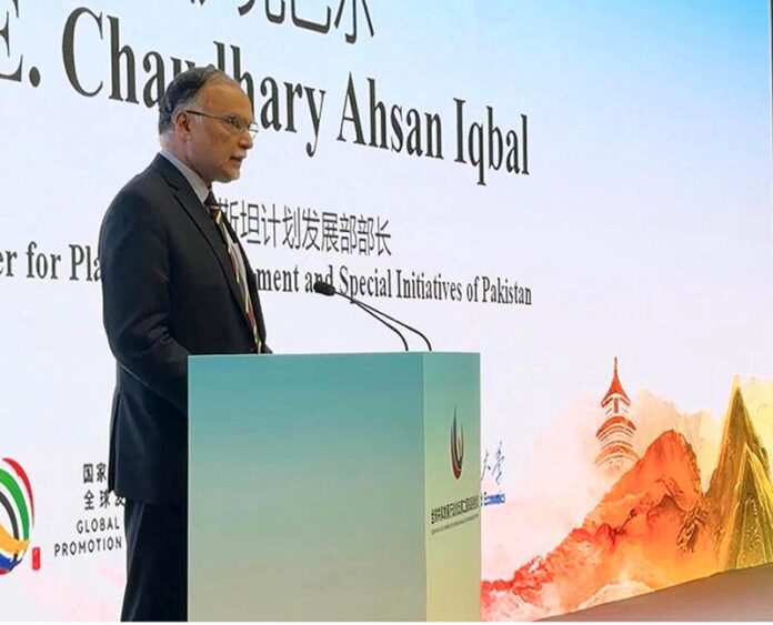 Planning Minister Prof. Ahsan Iqbal addressing a parallel forum on 