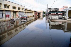 A view stagnant rainwater accumulated due to inadequate drainage system in front of Chandka Civil Hospital following a heavy downpour in the city.