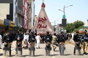 A large number of mourners attending the 9th Muharram Zuljinah procession passes through Saadar Road. Muharram Ul Haram is known as the first month of the Islamic calendar and the mourning month in remembrance of the martyrdom (Shahadat) of Hazrat Imam Hussain (RA), the grandson of the Holy Prophet Mohammad (PBUH).