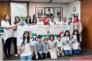High Commissioner-designate, Rabia Shafiq in a group photo with the students who participated in the Singapore International Maths Olympiad Challenge.