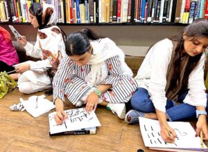 Female students participating in calligraphy workshop at The Book Studio organized by The Knowledge of Art Academy.