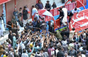 Mourners oozing themselves with knives and chains during procession on 9th Muharram ul Harram. Muharram Ul Haram is known as the first month of the Islamic calendar and the mourning month in remembrance of the martyrdom (Shahadat) of Hazrat Imam Hussain (RA), the grandson of the Holy Prophet Mohammad (PBUH).