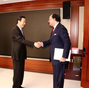 Senator Muhammad Aurangzeb Federal Minister for Finance & Revenue shaking hands with Mr. Ren Jingong, Vice Administrator National Energy Administration (NEA).