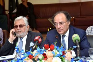 Federal Minister for Finance and Revenue Muhammad Aurangzeb addressing the members of Karachi Chambers of Commerce and Industries (KCCI).