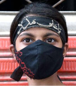 - A young girl attending a procession on 10th of Holy Month of Muharramul Harram. Muharram is the mourning month in remembrance of the Shahadat of Hazrat Imam Hussain (RA), the Grandson of the Holy Prophet Mohammad (PBUH).
