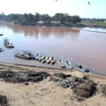 A view of boats parked at the bank of River Ravi in the provincial capital