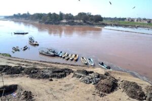 A view of boats parked at the bank of River Ravi in the provincial capital