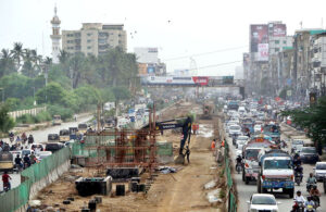 A view of the development work of Red Line is underway with the help of heavy machinery at University Road.