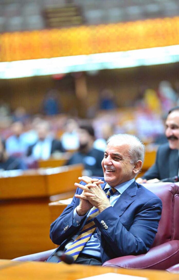 Prime Minister Muhammad Shehbaz Sharif interacts with the Parliamentarians during a session of the National Assembly