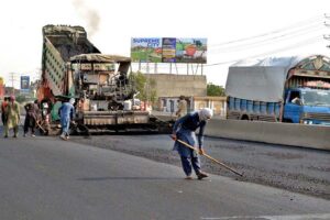 Workers are using heavy machinery to repair the GT Road near Shahdara and make the journey comfortable for commuters