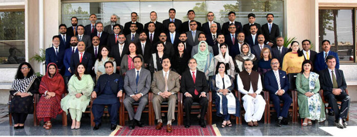 Chairman Senate, Syed Yousuf Raza Gilani in a group photo with the participants of 35th senior management course at National Institute of Management (NIM