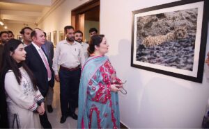 Coordinator to PM on Climate Change, Romina Khurshid Alam gives away a certificate of recognition to a wildlife official in recognition of wildlife protection at the Pakistan Wildlife Protection Award ceremony 2024 at Pakistan National Council of Arts.